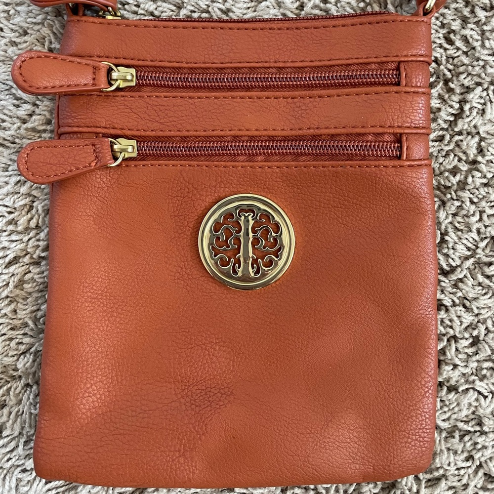 Small, tan, crossbody purse